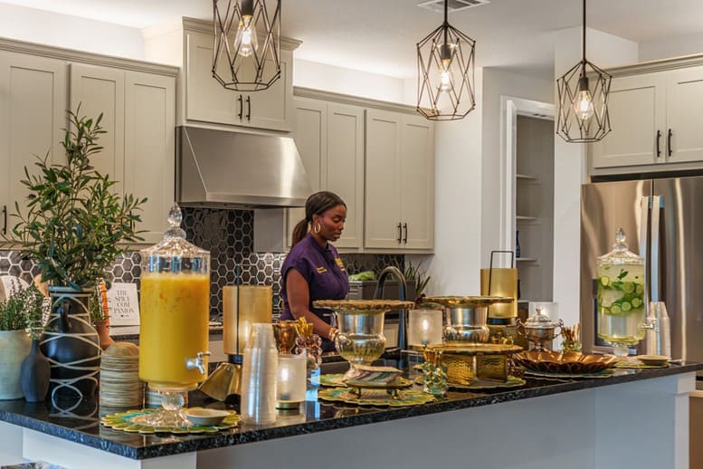 Modern kitchen with stylish decor perfect for hosting festive holiday parties.