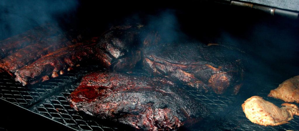 Picture of a smoker at a BBQ contest with winning brisket